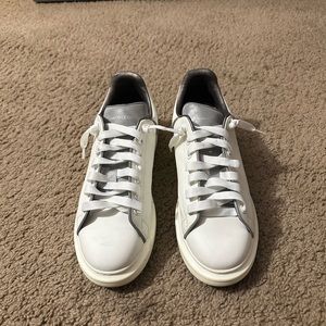 Alexander McQueen white reflective.